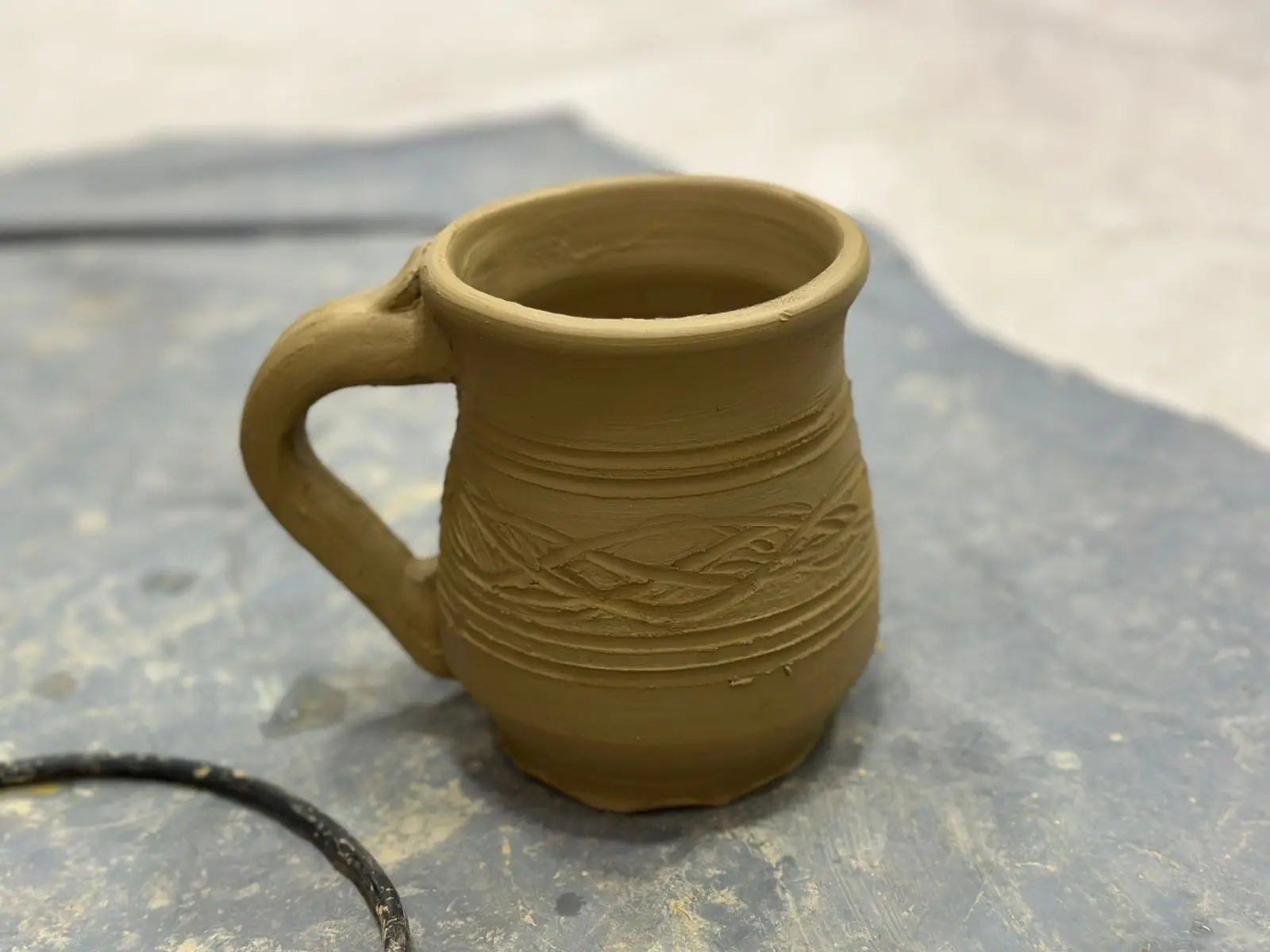 Зображення для новини Глина, гарний настрій і трохи магії: майстер-клас з гончарства для наших захисників